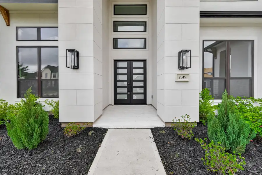 Exterior details and patio area of a home in , Brookshire (Image 3).