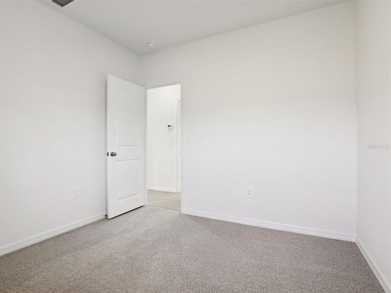 Spacious, unfurnished interior of a new home in Coasterra - Premier Series, Palmetto (Image 14).