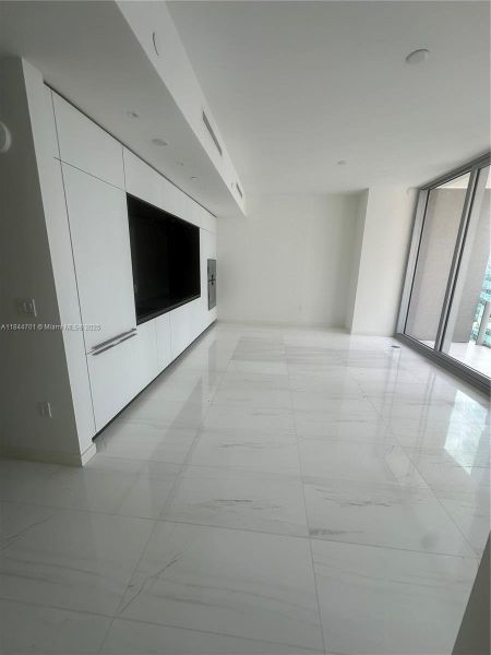 Spacious, unfurnished interior of a new home in Aston Martin Residences, Miami (Image 12).
