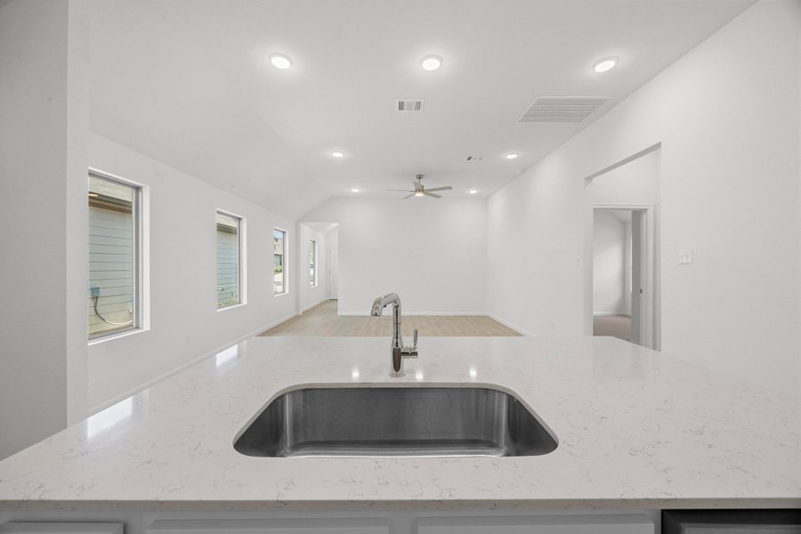 Kitchen in the Cypress home plan by Trophy Signature Homes - REPRESENTATIVE PHOTO Kitchen in the Cypress home plan by Trophy Signature Homes - REPRESENTATIVE PHOTO