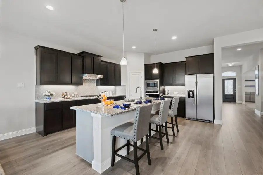 Kitchen - All Home and community information, including pricing, included features, terms, availability and amenities, are subject to change at any time without notice or obligation. All Drawings, pictures, photographs, video, square footages, floor plans, elevations, features, colors and sizes are approximate for illustration purposes only and will vary from the homes as built.