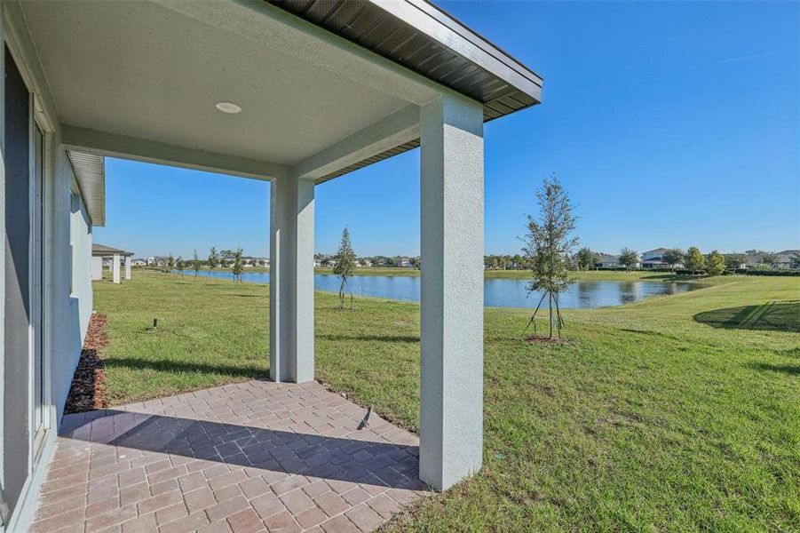 Exterior details and patio area of a home in The Reserve at Twin Lakes, St. Cloud (Image 23).