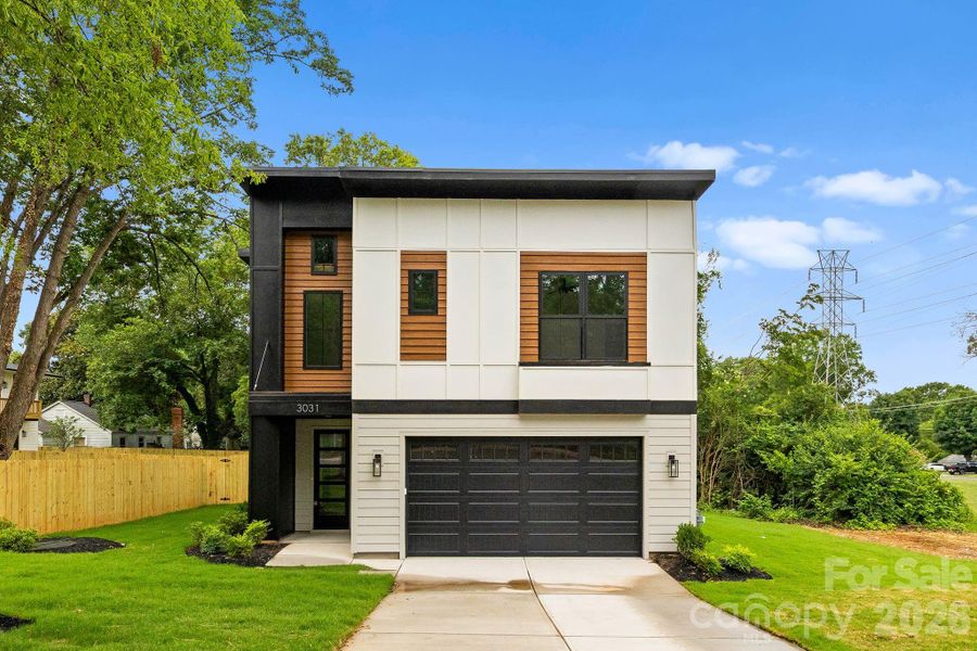 Front exterior of a new home in , Charlotte, NC, highlighting curb appeal (Image 26).