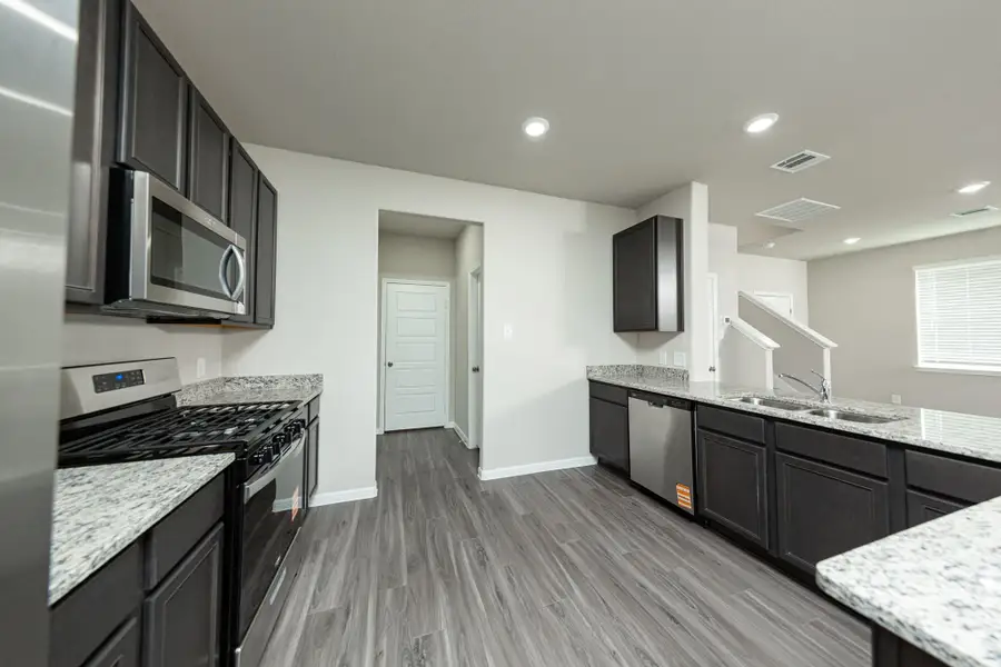 Furnished interior view inside a new home in Mackenzie Creek, Conroe (Image 4). Furnished interior view inside a new home in Mackenzie Creek, Conroe (Image 4).