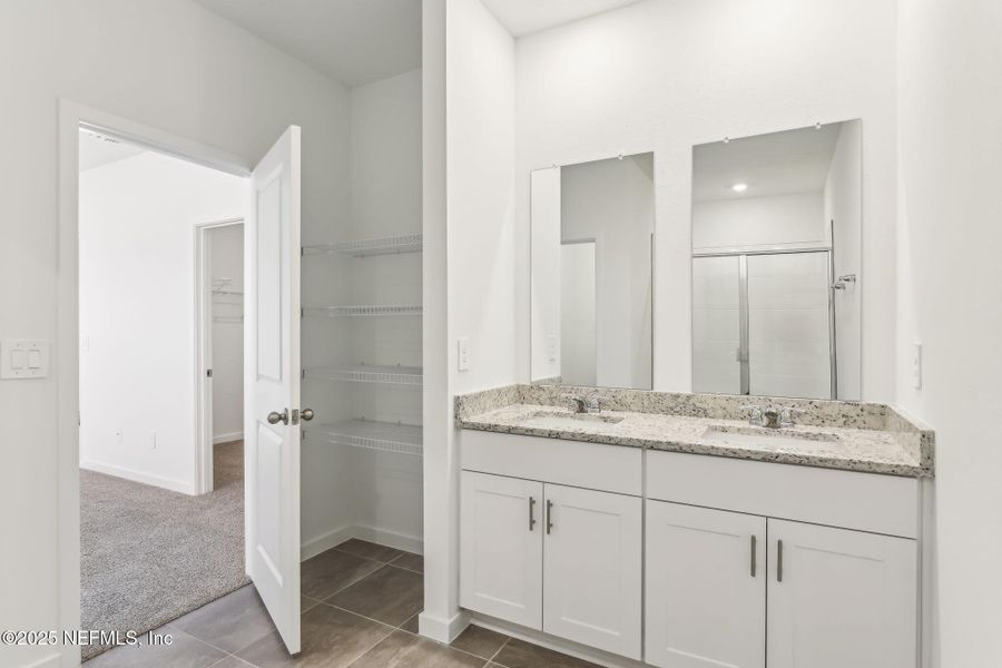 Furnished interior view inside a new home in Lakes at Bella Lago - Signature Series, Green Cove Springs (Image 10). Furnished interior view inside a new home in Lakes at Bella Lago - Signature Series, Green Cove Springs (Image 10).