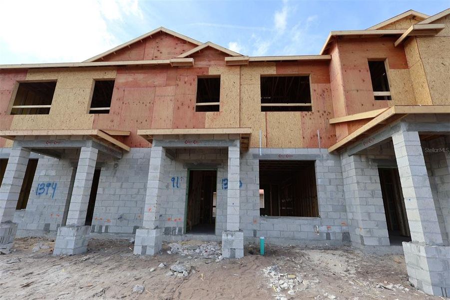 In-progress construction of a new home in Center Lake on the Park, St. Cloud, FL (Image 10).