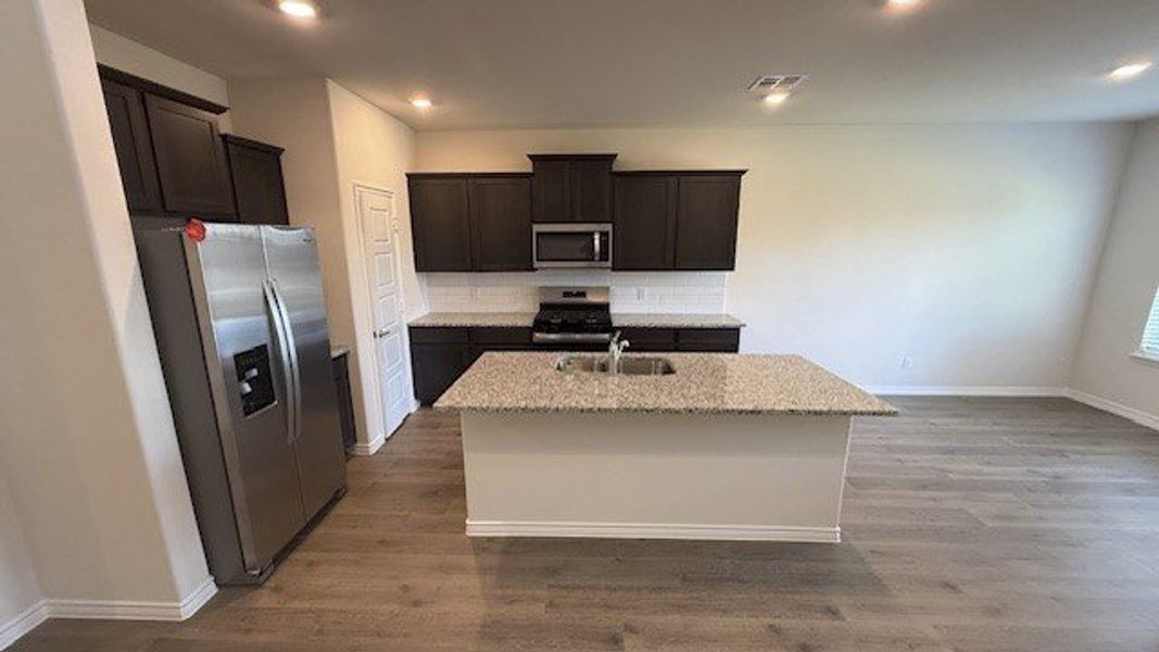 Furnished interior view inside a new home in Fireside by the Lake, Garland (Image 5).