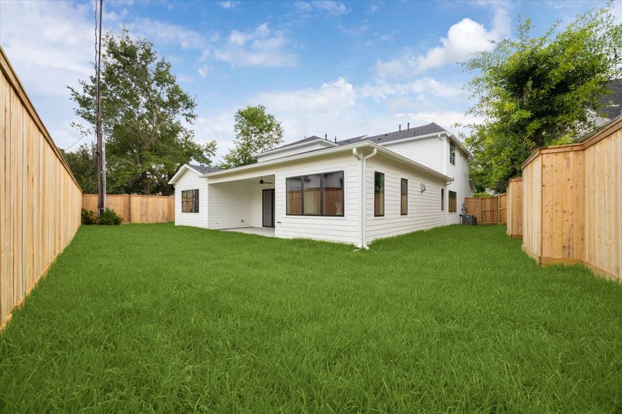 Front exterior of a new home in , Houston, TX, highlighting curb appeal (Image 13).
