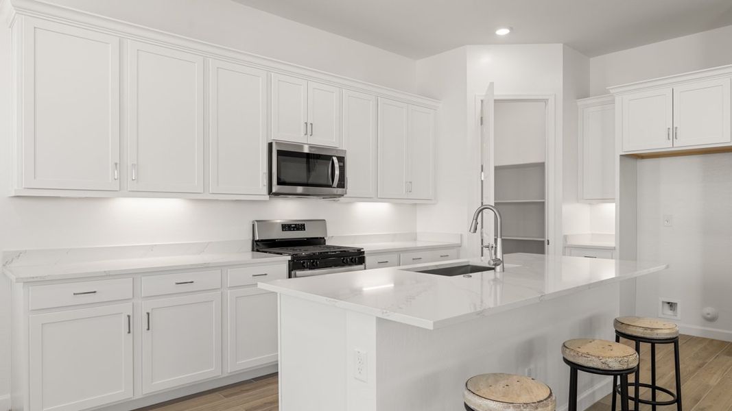 Representative furnished interior of a home built from the Crow by D.R. Horton in Apache Farms, Buckeye (Image 8).