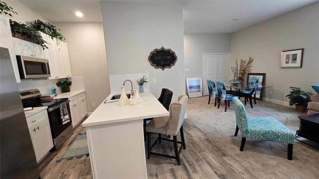 Furnished interior view inside a new home in , The Woodlands (Image 8). Furnished interior view inside a new home in , The Woodlands (Image 8).