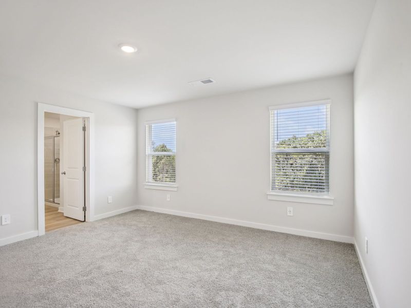 The primary suite offers a private retreat. The primary suite offers a private retreat.