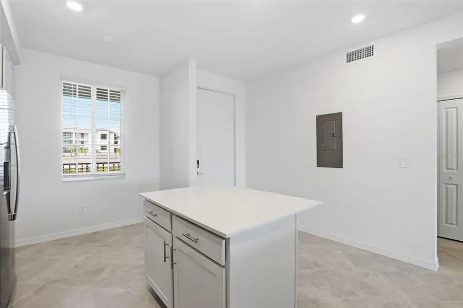 Furnished interior view inside a new home in Wellen Park Golf & Country Club, Venice (Image 4).