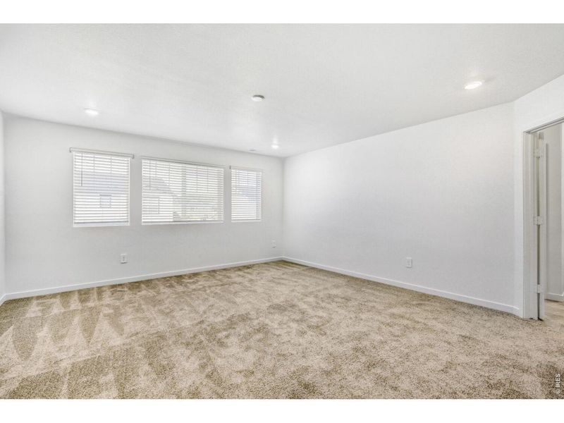 Spacious, unfurnished interior of a new home in Riano Ridge, Loveland (Image 9).