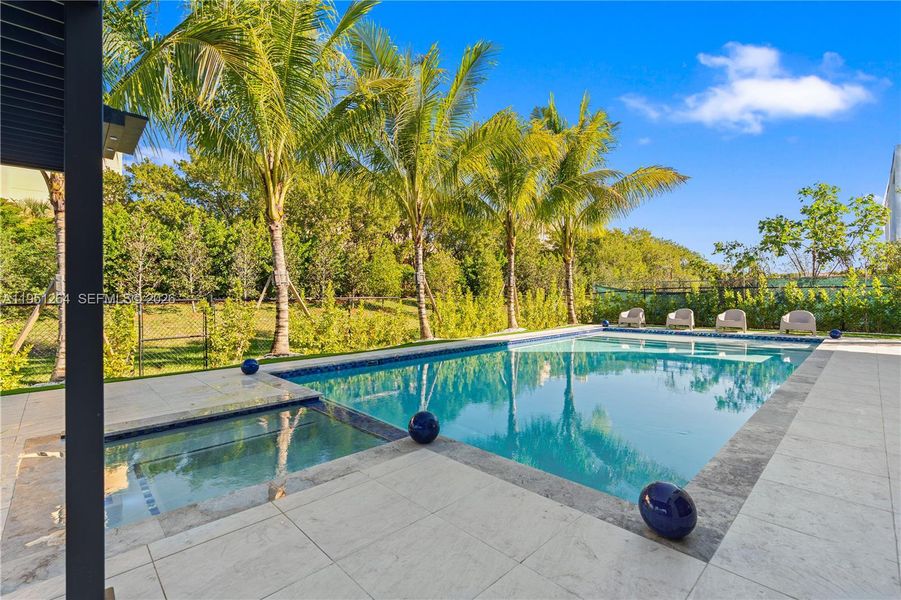 Exterior details and patio area of a home in , Weston (Image 38).