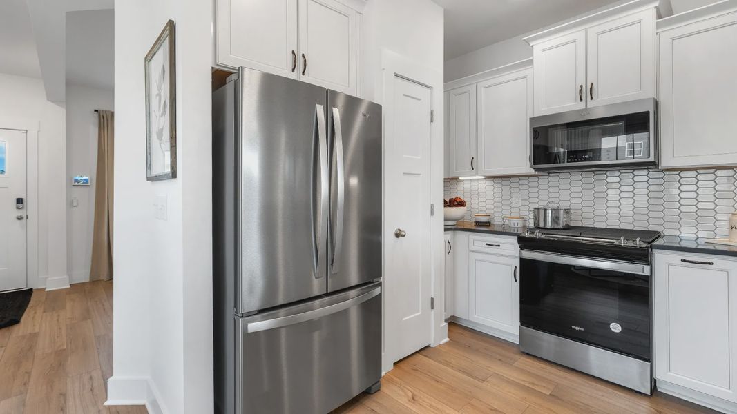 Exclusive DRB Homes kitchen with a stainless steel appliances and elevated finishes in a prime location