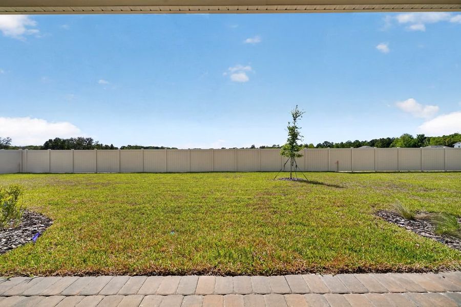 Exterior details and patio area of a home in Headwaters at Lofton Creek, Yulee (Image 4).