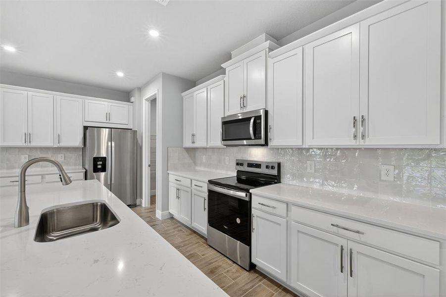 Furnished interior view inside a new home in Windwater, Parrish (Image 12).