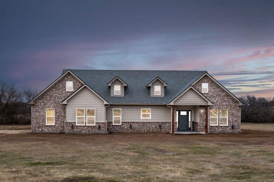 Craftsman inspired home with a lawn