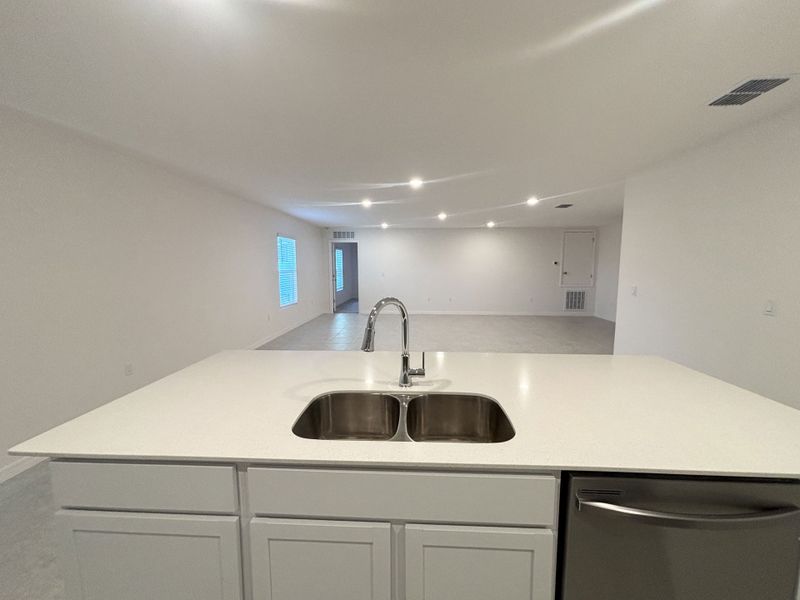 Furnished interior view inside a new home in Poinciana, Kissimmee (Image 3).
