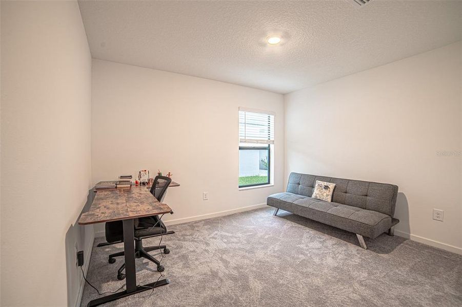Furnished interior view inside a new home in The Crossing at Palm River, Tampa (Image 16).