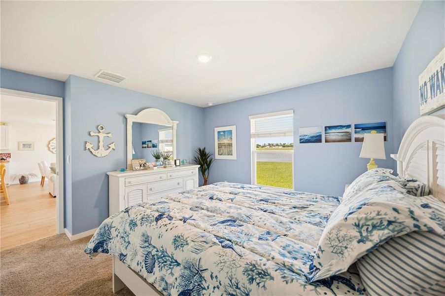 Furnished interior view inside a new home in Central Parc, North Port (Image 36).