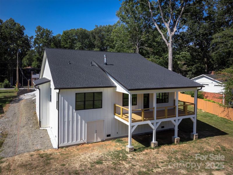 Front exterior of a new home in , Hendersonville, NC, highlighting curb appeal (Image 28).