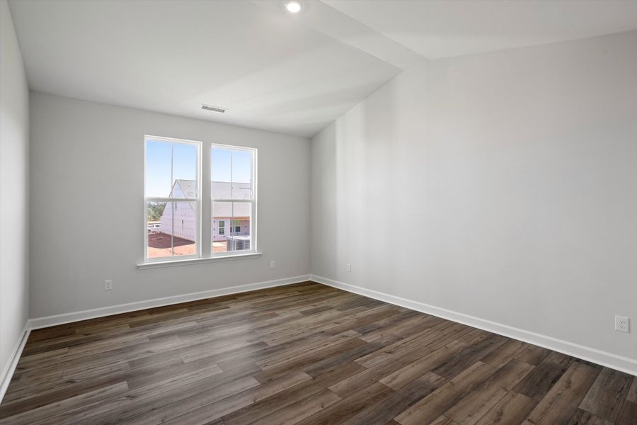 Spacious, unfurnished interior of a new home in Ovation at Sweetbrier, Durham (Image 24).