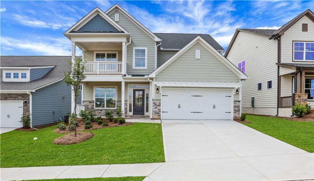Front exterior of a new home in , Loganville, GA, highlighting curb appeal (Image 22).