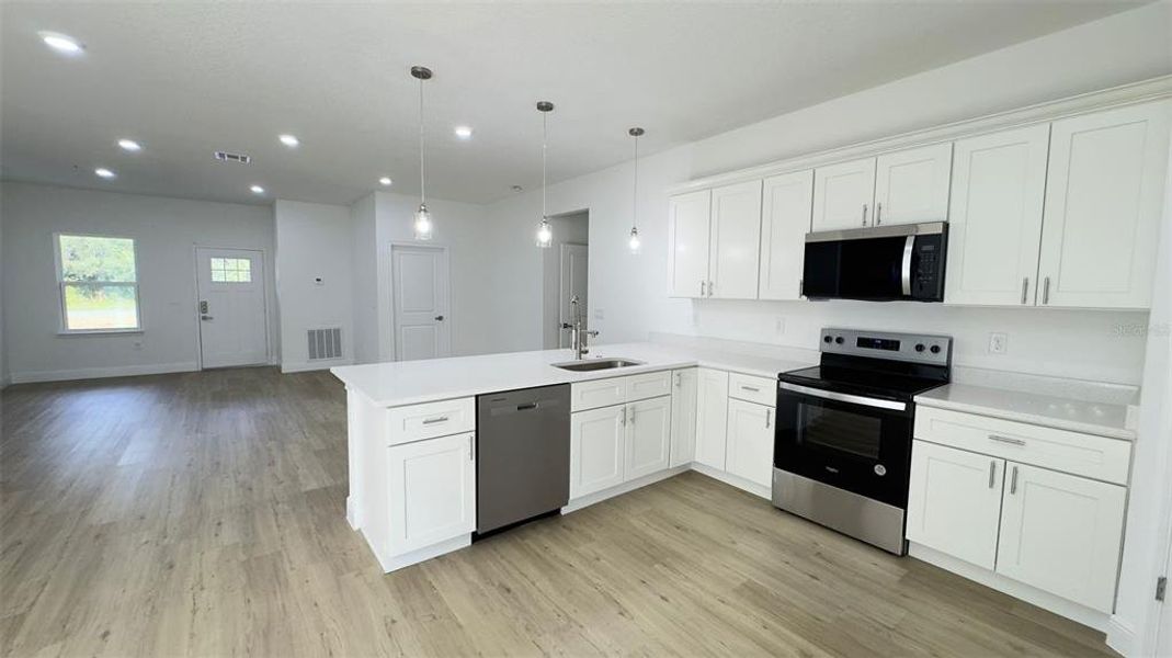Furnished interior view inside a new home in , Dunnellon (Image 4).