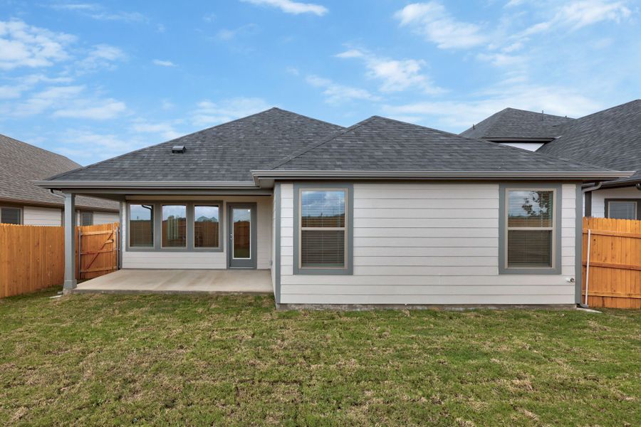 Exterior details and patio area of a home in Prairie Winds, Hutto (Image 4). Exterior details and patio area of a home in Prairie Winds, Hutto (Image 4).