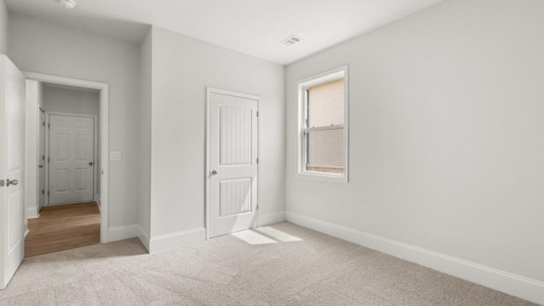 Spacious, unfurnished interior of a new home in Haven Abbey, Cumming (Image 17).