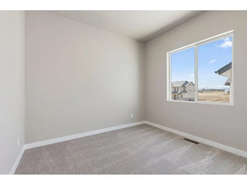 Spacious, unfurnished interior of a new home in Highlands Preserve, Mead (Image 11).
