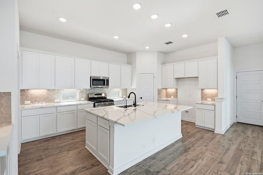 Furnished interior view inside a new home in The Crossvine, Schertz (Image 12).