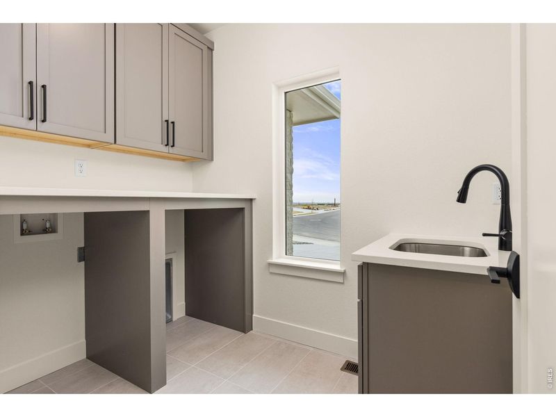 Furnished interior view inside a new home in RainDance, Windsor (Image 15).