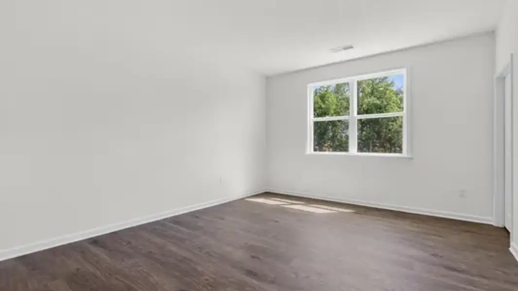 Spacious, unfurnished interior of a new home in The Villas at Galvins Ridge, Sanford (Image 20).
