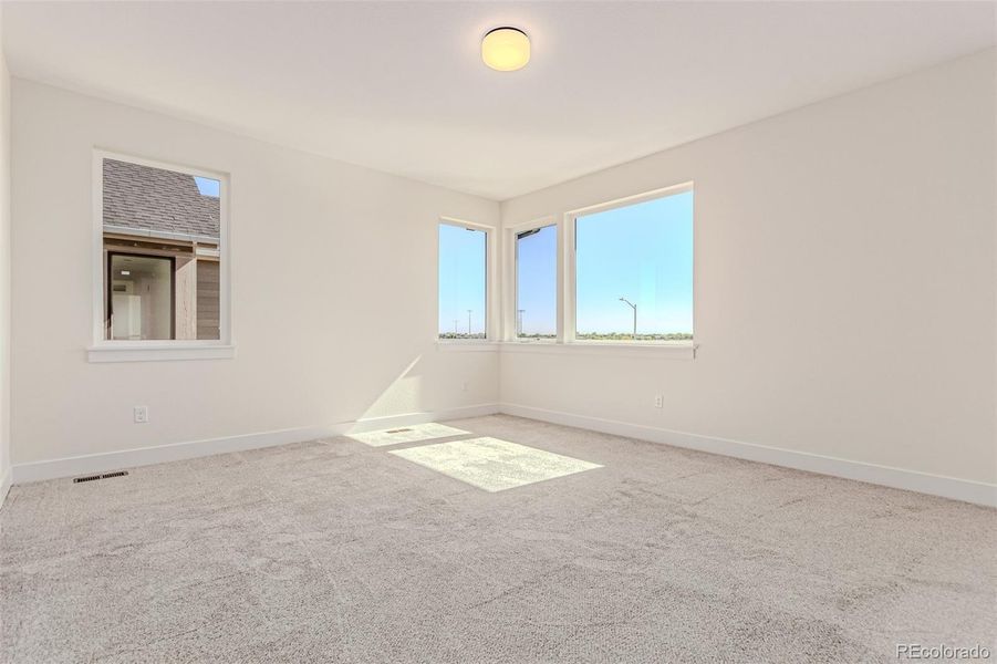 Spacious, unfurnished interior of a new home in West Grange, Longmont (Image 26).