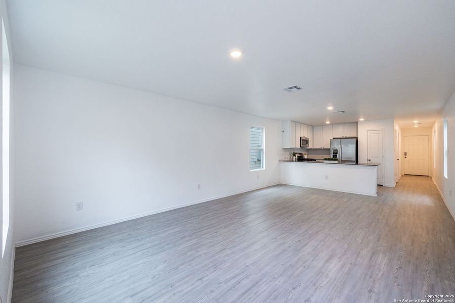 Spacious, unfurnished interior of a new home in Aston Park: Wellton Collection, San Antonio (Image 13).