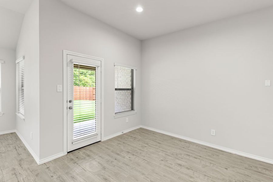 Representative exterior photo of a completed home built from the Boston by Impression Homes in Keeneland, Aubrey, TX (Image 12).