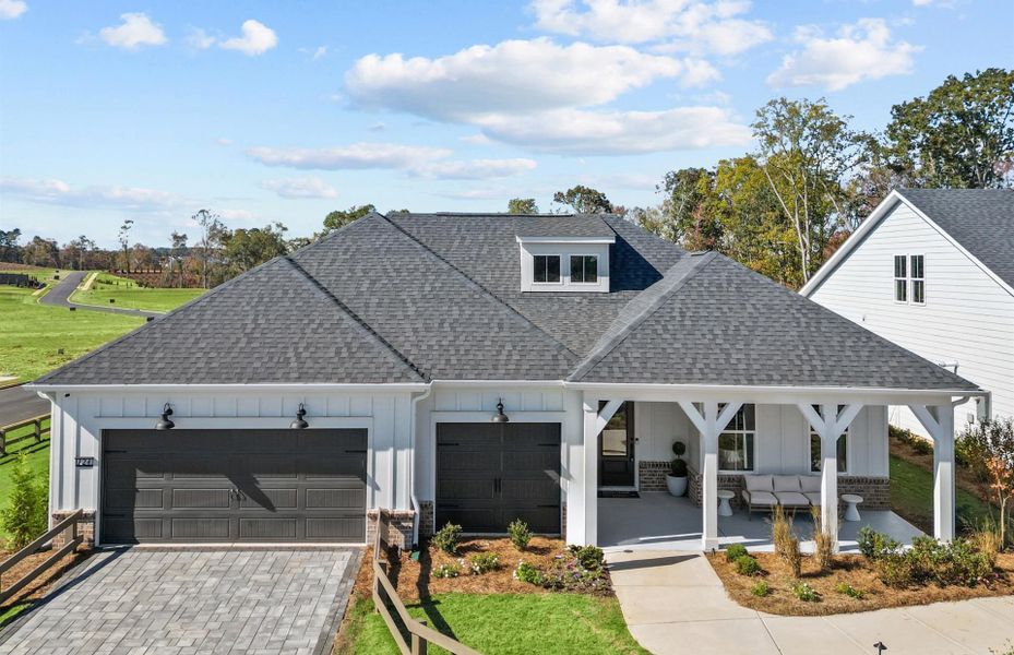 Representative exterior photo of a completed home built from the Stardom by Pulte Homes in Duncan Pointe, Braselton, GA (Image 23). Representative exterior photo of a completed home built from the Stardom by Pulte Homes in Duncan Pointe, Braselton, GA (Image 23).