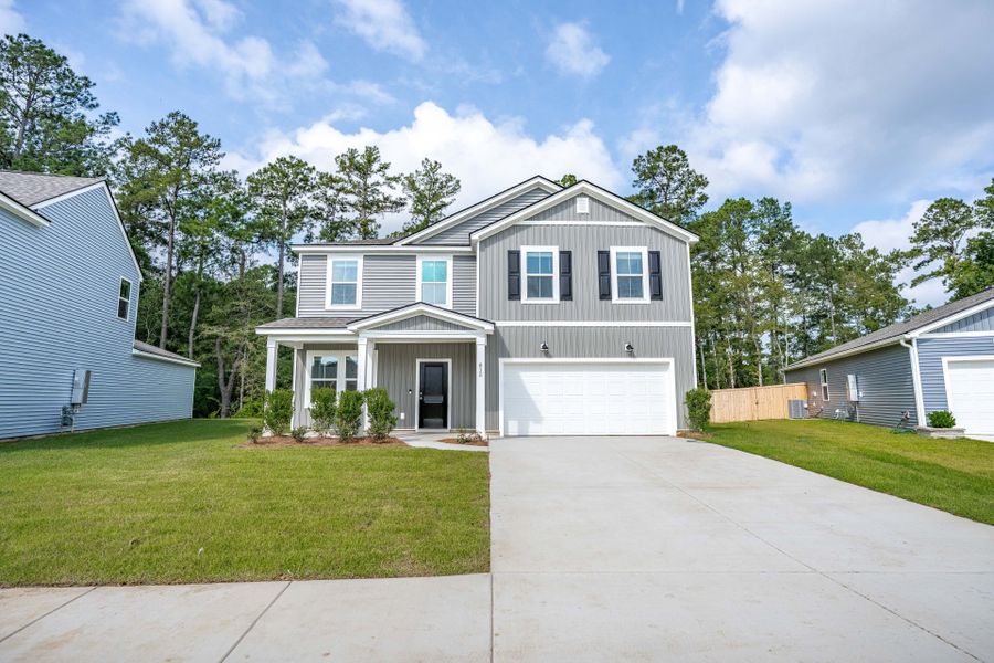 Front exterior of a new home in Bradford Pointe, Summerville, SC, highlighting curb appeal (Image 19).