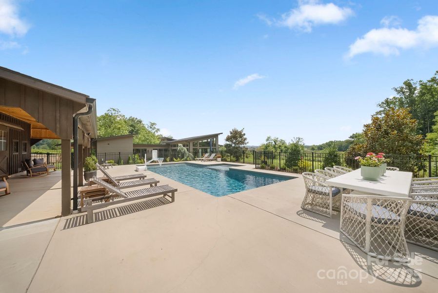 Front exterior of a new home in , Hendersonville, NC, highlighting curb appeal (Image 23).