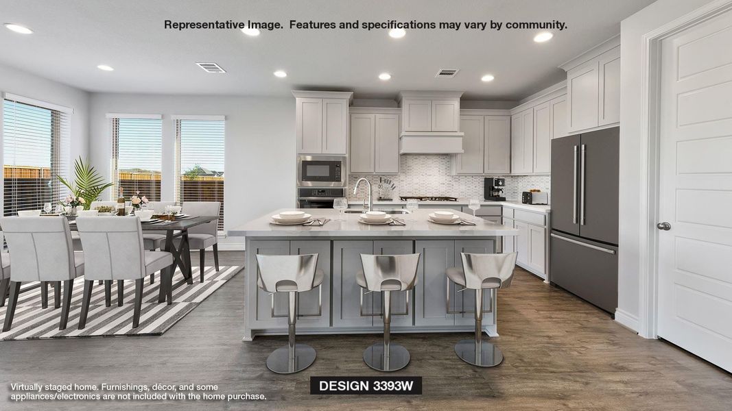 Kitchen with visible vents, a sink, tasteful backsplash, dark wood-style floors, and appliances with stainless steel finishes