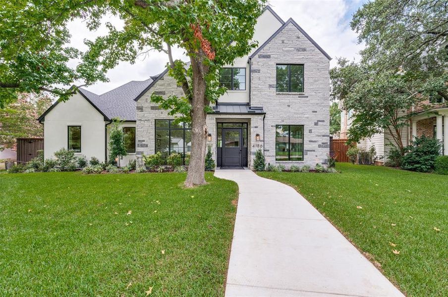 View of front of home featuring a front lawn