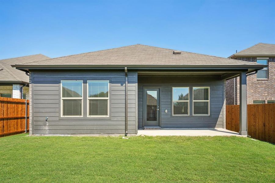 Exterior details and patio area of a home in Simpson Crossing - Spring Series, McKinney (Image 4). Exterior details and patio area of a home in Simpson Crossing - Spring Series, McKinney (Image 4).