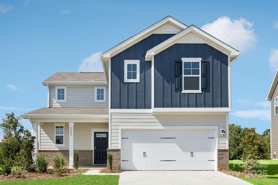 Front exterior of a new home in Blue Sky Meadows, Monroe, NC, highlighting curb appeal (Image 1). Front exterior of a new home in Blue Sky Meadows, Monroe, NC, highlighting curb appeal (Image 1).