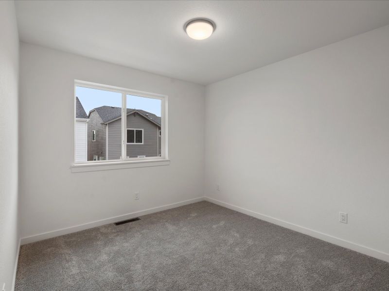 Spacious, unfurnished interior of a new home in Parkside at Victory Ridge, Colorado Springs (Image 22).