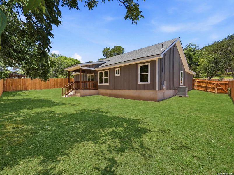 Exterior details and patio area of a home in , Kerrville (Image 29).