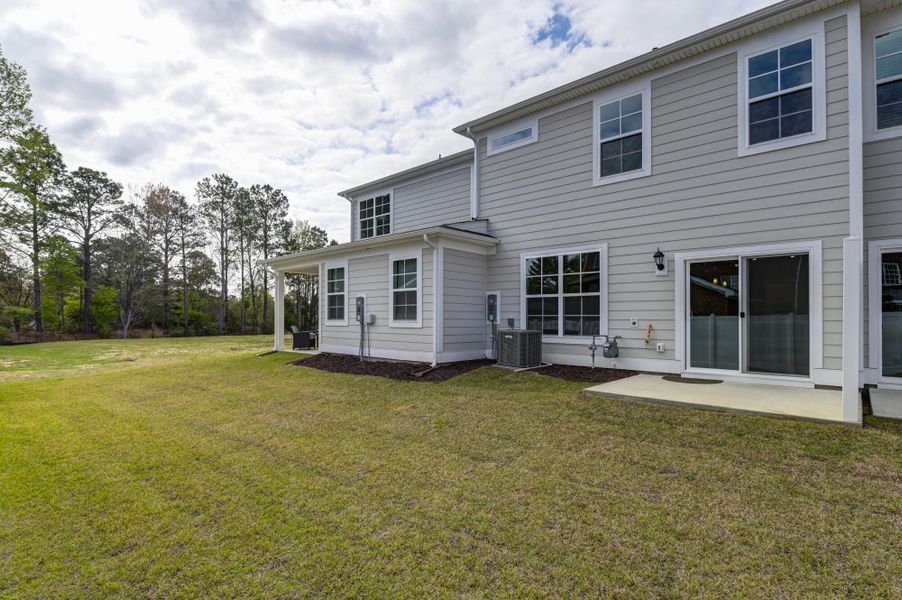 Exterior details and patio area of a home in Lake Carolina Townhomes, Columbia (Image 32).