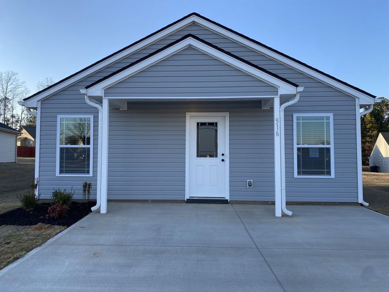 Front exterior of a new home in Gentry Place, Spartanburg, SC, highlighting curb appeal (Image 18).