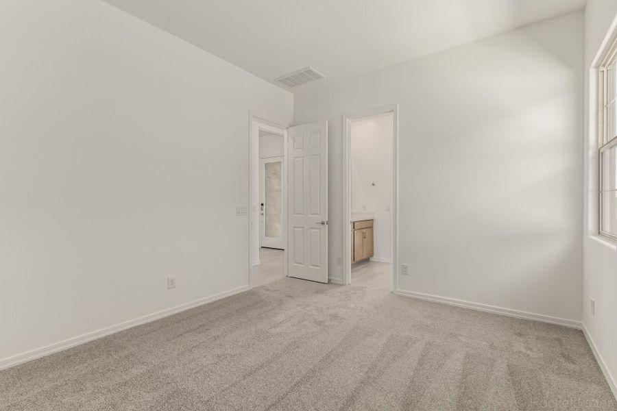 Spacious, unfurnished interior of a new home in Empire Pointe, Queen Creek (Image 15).